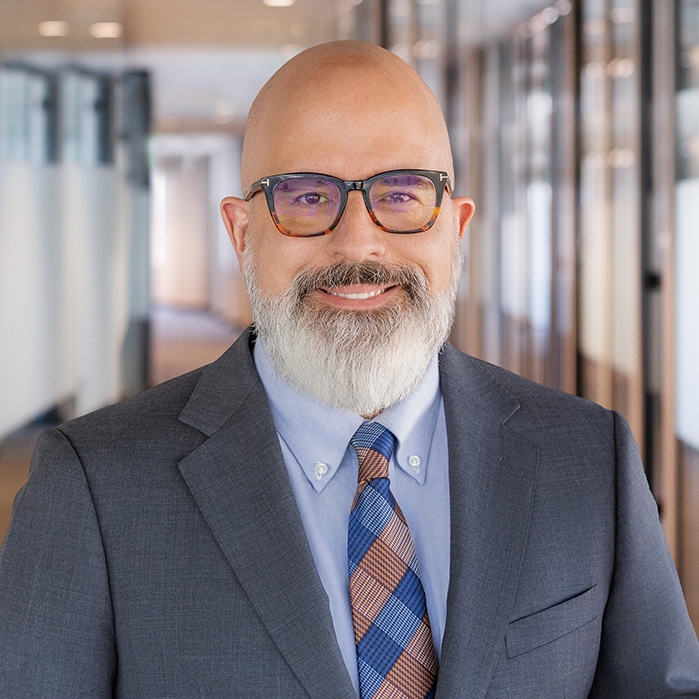 Headshot photo of Ezra S. Gollogly